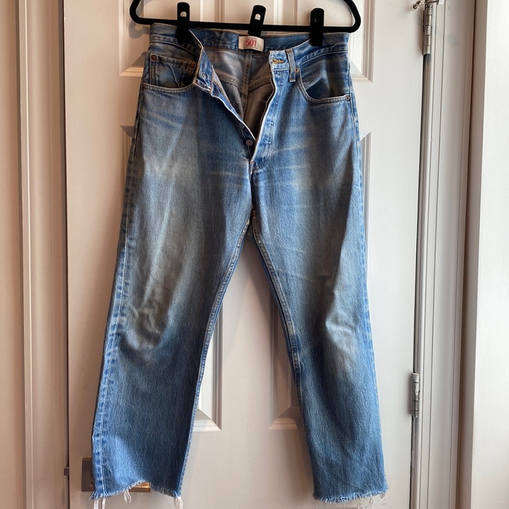 Vintage Levi’s 501 Straight Leg Button Fly jeans with cut off hem